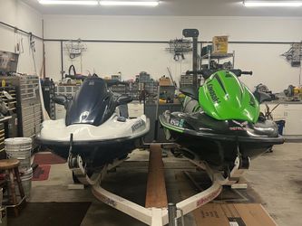 Kawasaki STX-12F and Kawasaki ST-15F with Trailer