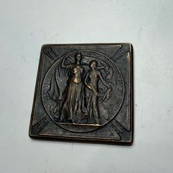 a bronze medal awarded at the World's Fair in St. Louis in 1904