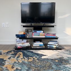 Black glass tv stand with shelves