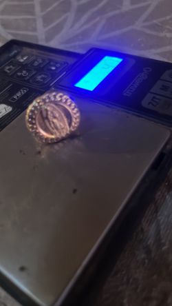 Golden Virgin Mary ring with stones