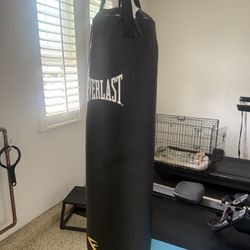 Heavy Boxing Bag And Two Sets Of Boxing Gloves 