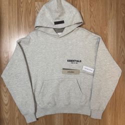 Fear Of God Essentials Light Oatmeal And Black Hoodie