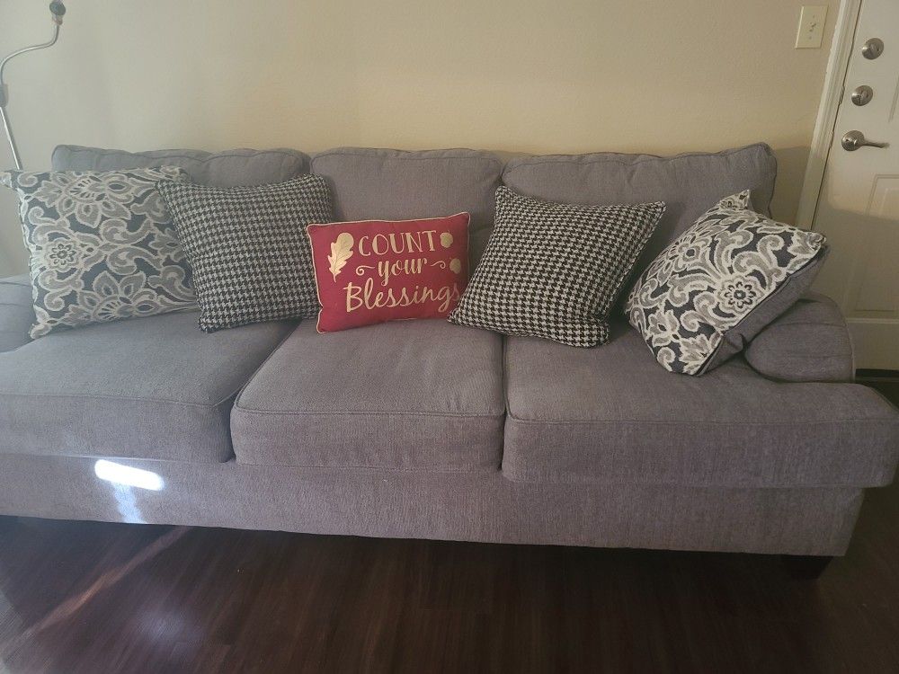 3 sitter Couch with 2 Throw Pillows 