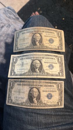 3 older silver dollars