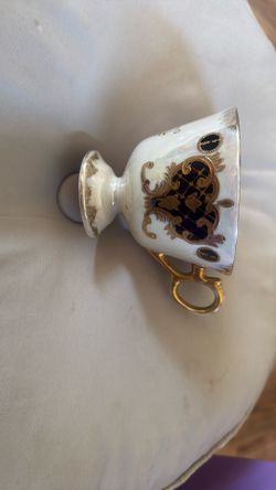 Vintage teacup with gold trim
