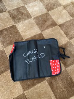 Travel roll up chalk board. Wipe clean.