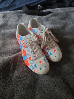 Size 3 youths White soccer cleats with Orange and Blue Triangle Print