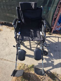 Black Wheelchair with Elevating Leg Rests