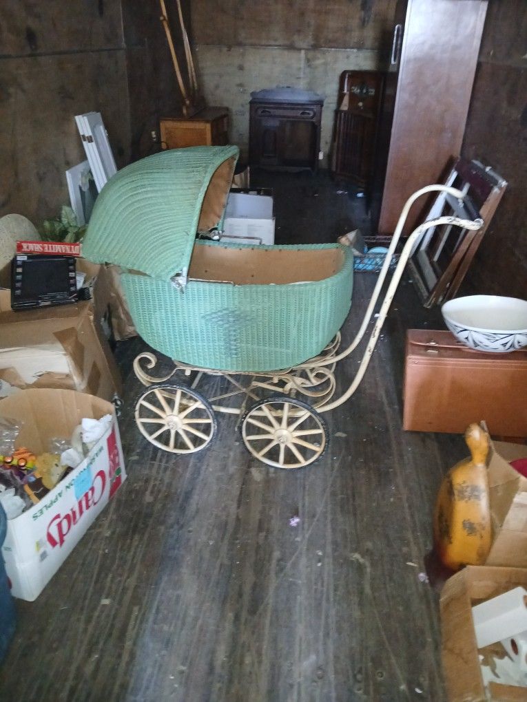 An antique baby stroller.