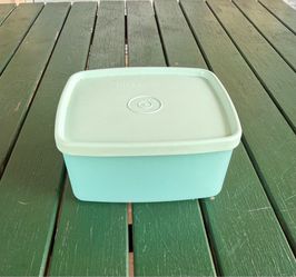 Vintage blue Tupperware storage container and lid