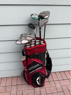 Mens Cleveland golf club set with Warrior woods. Complete set right handed with golf  bag
