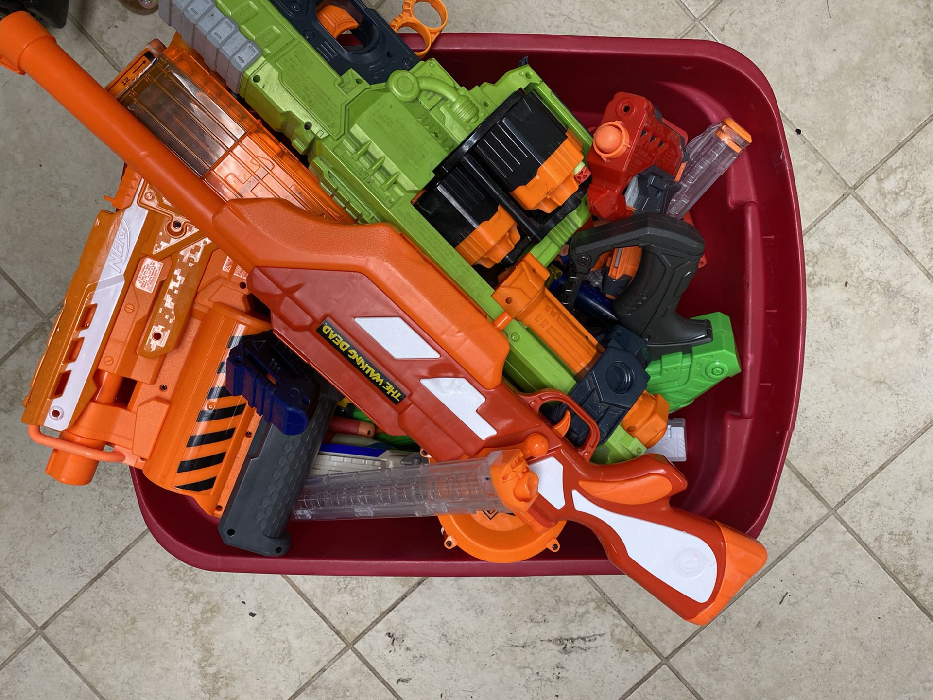 Tub of nerf guns and bullets