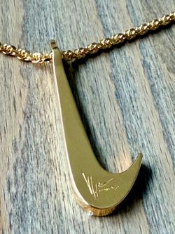 Victor Solomon Nike Necklace