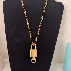 Louis Vuitton Lock and Key #305 in gold tone with chain