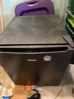 Small dorm room refrigerator