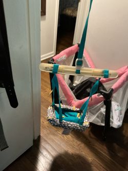 An Almost New Playpen With Many Stuff , Swings , A Nice Pillow (all For $40)