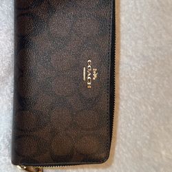 coach long zip around wallet in signature canvas 