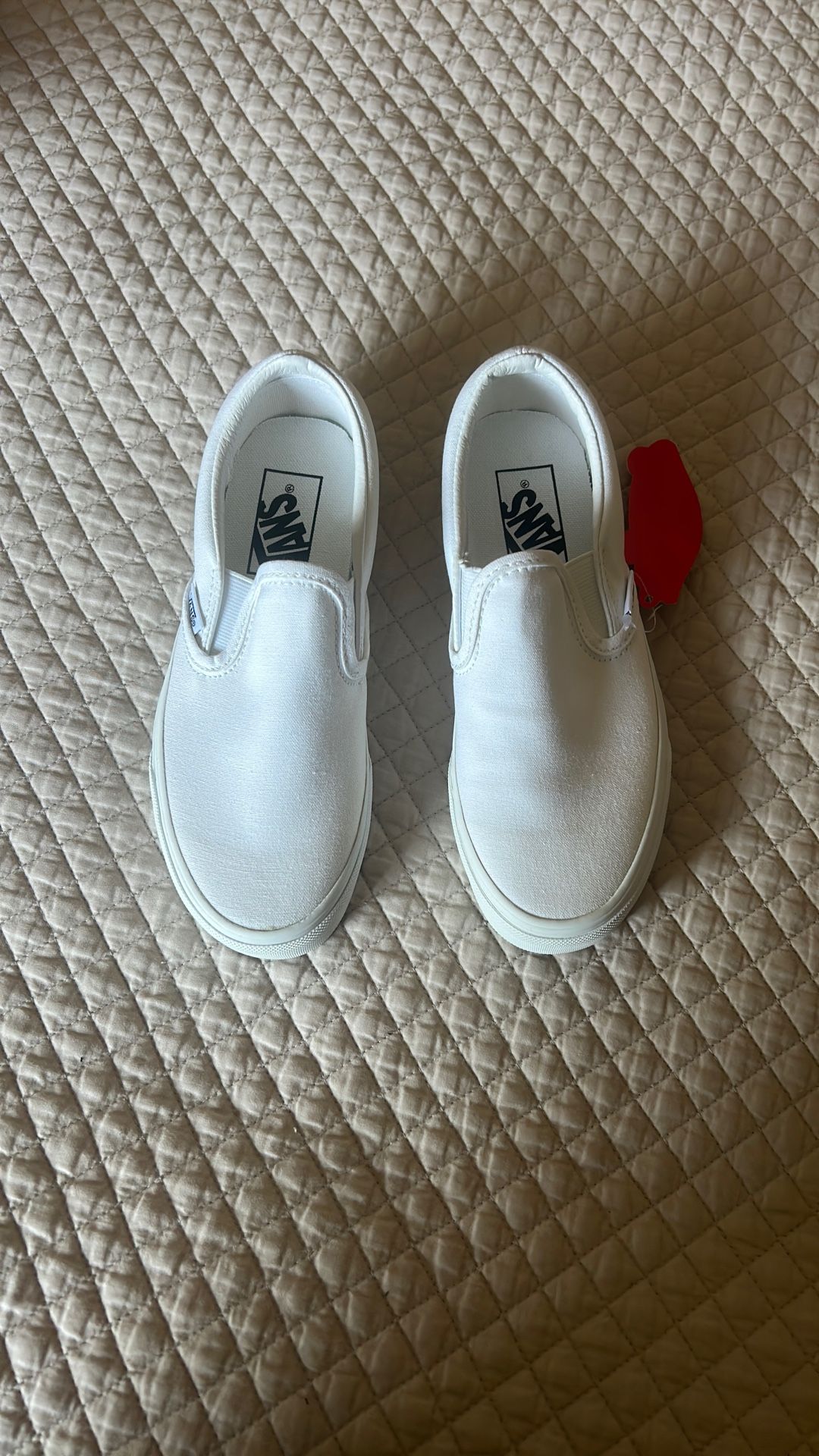 White slip On Vans
