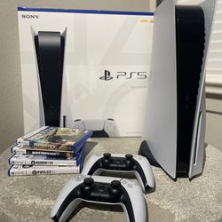 PS5 W/2 Controllers And 4 Games 