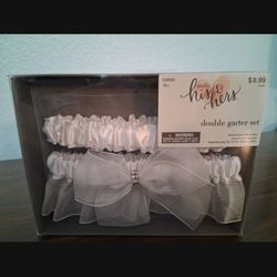 Unused, unopened his and hers garters