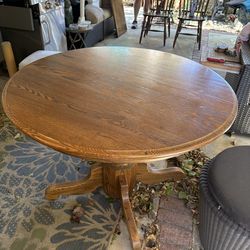 Solid oak table, chairs, and a leaf