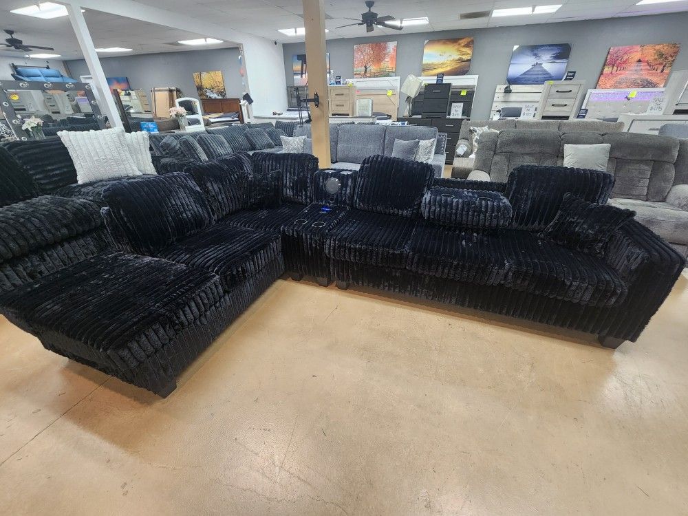 Jumbo Curdoroy Reversible Sectional W/Bluetooth Speaker And Cupholder Console Also Drop Down Cupholders