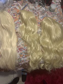 3 NEW Blonde wigs .
