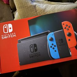 Nintendo Switch With Neon Blue And Red Joy-Con
