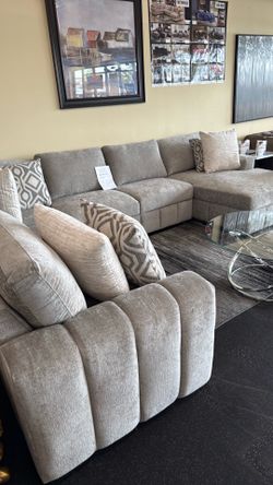 4 Piece Sectional with pullout bed & storage chaise on Sale