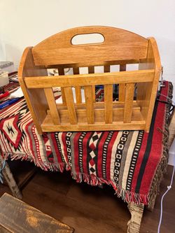Book holder beside the chairs