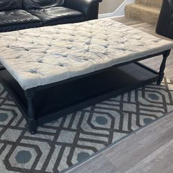 Coffee Table With Cushion Material On Top