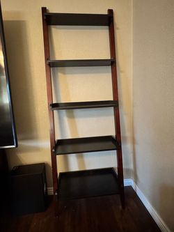 Dark wood and black leaning ladder book shelf