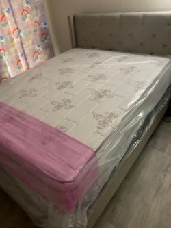 New queen mattress and box spring 2 pc bed frame is not included