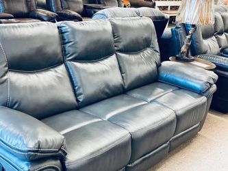 Genuine leather power reclining sofa brand new