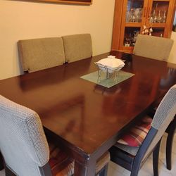 Wooden table And 6 Upholstery Chairs