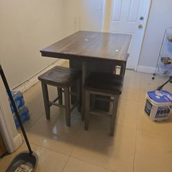solid wood table with 4 stool