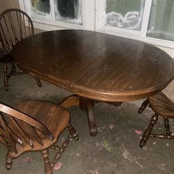 Wood table and chairs (not sure the size) 
