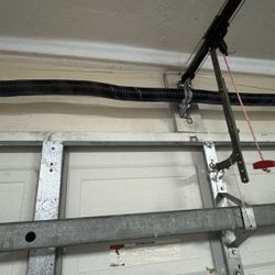 Garage Door Broken Spring Opener Off Track Adjustment Replace And Parts 