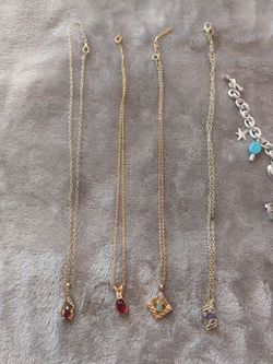 Possible Garnet, rhodonite , ruby , sapphire , topaz ,amethyst