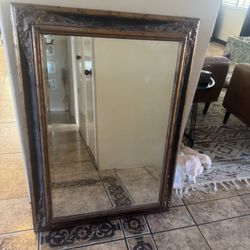 antique-style wall mirror