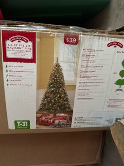Brand new fake Christmas tree with lights