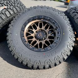 17” new bronze wheels 6x5.5 33” RT tires Ford Bronco GMC Sierra Toyota Tundra rims