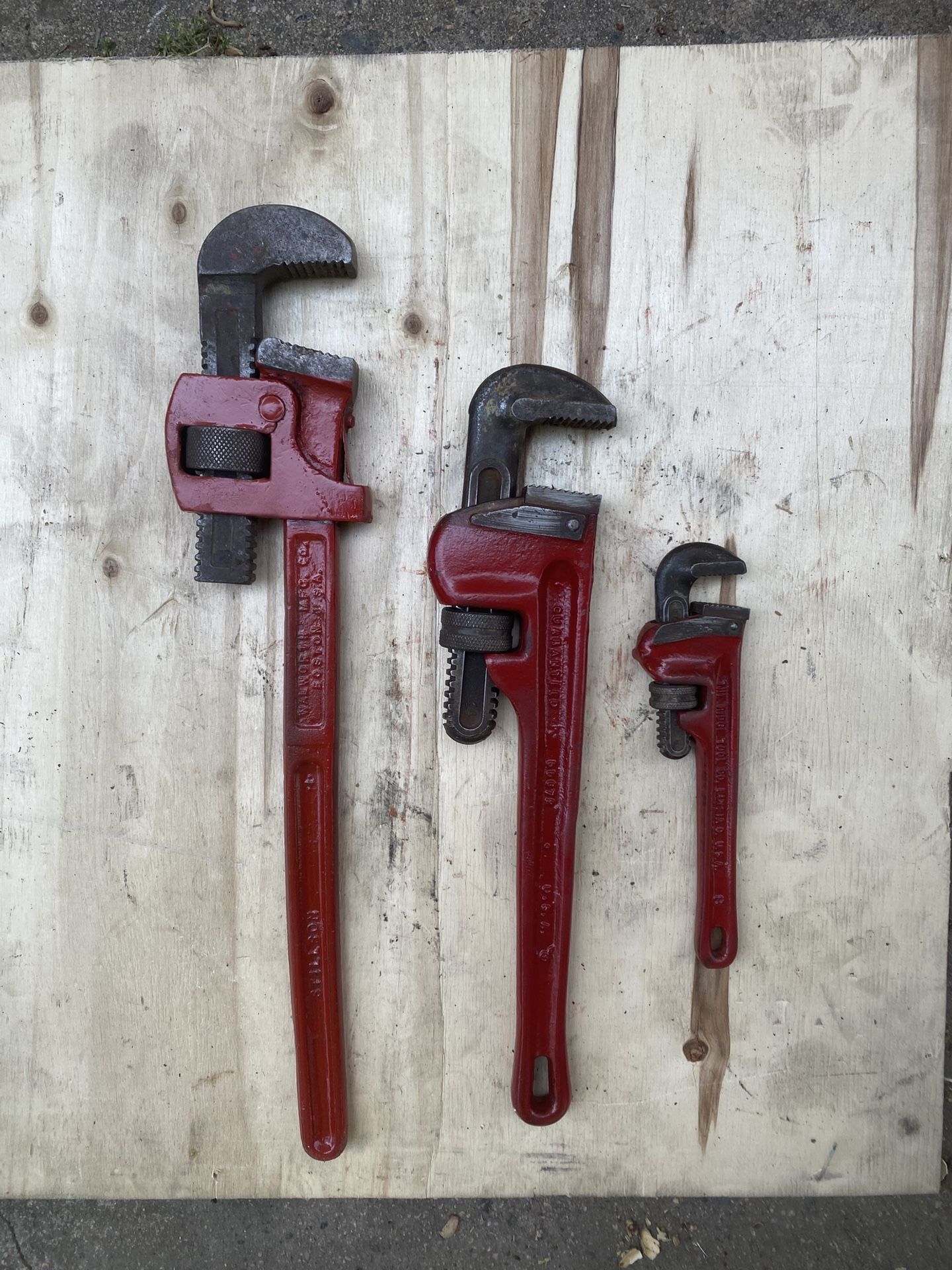 Three pipe wrenches
