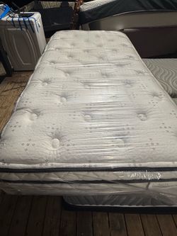 Twin size pillow, top mattresses, and boxspring