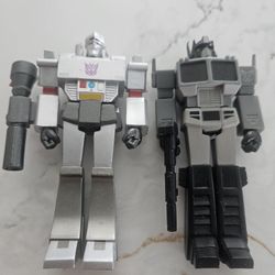 Super7 Reaction Transformers - Megatron And Optimus Prime  3.75 Figure