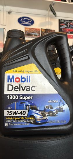 Mobil oil  15W-40 … 4 , 4 gallon containers