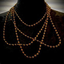 NEW, 4 Beaded Necklaces. Color: Light Brown & Black. Each Lenght: 25".