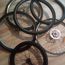 Assorted Rim And Tires Set