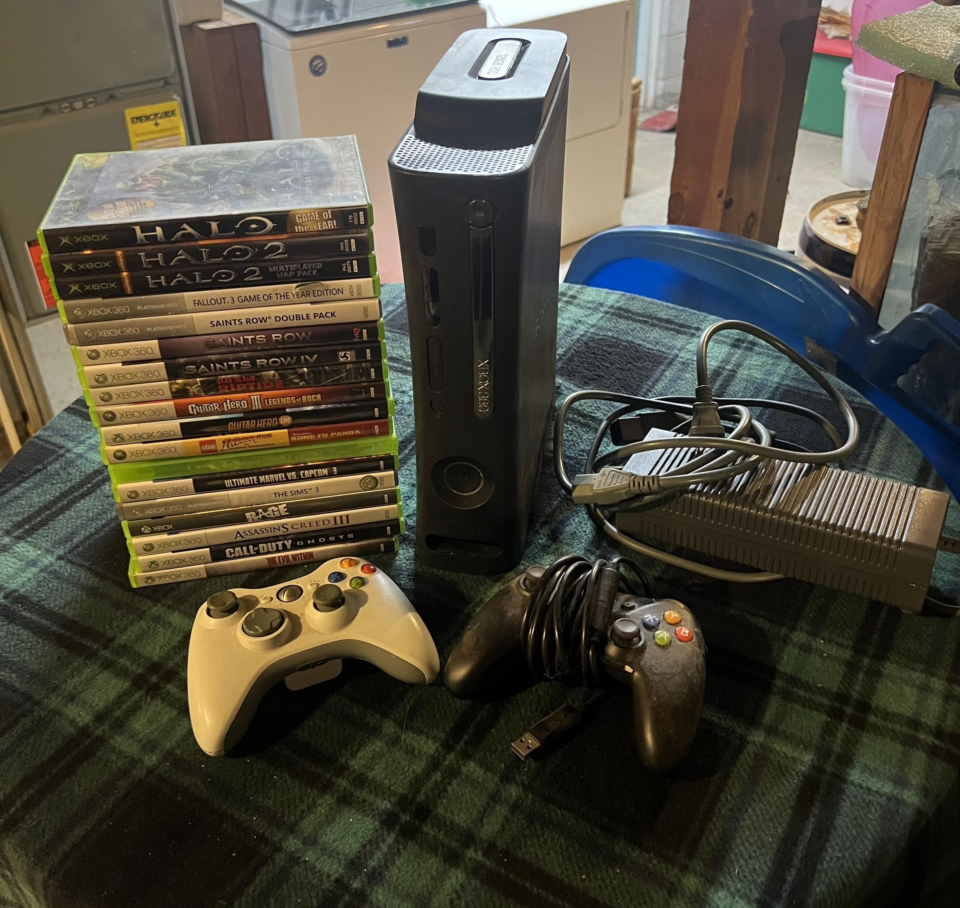 Xbox 360, Cables, Controllers, and Games.