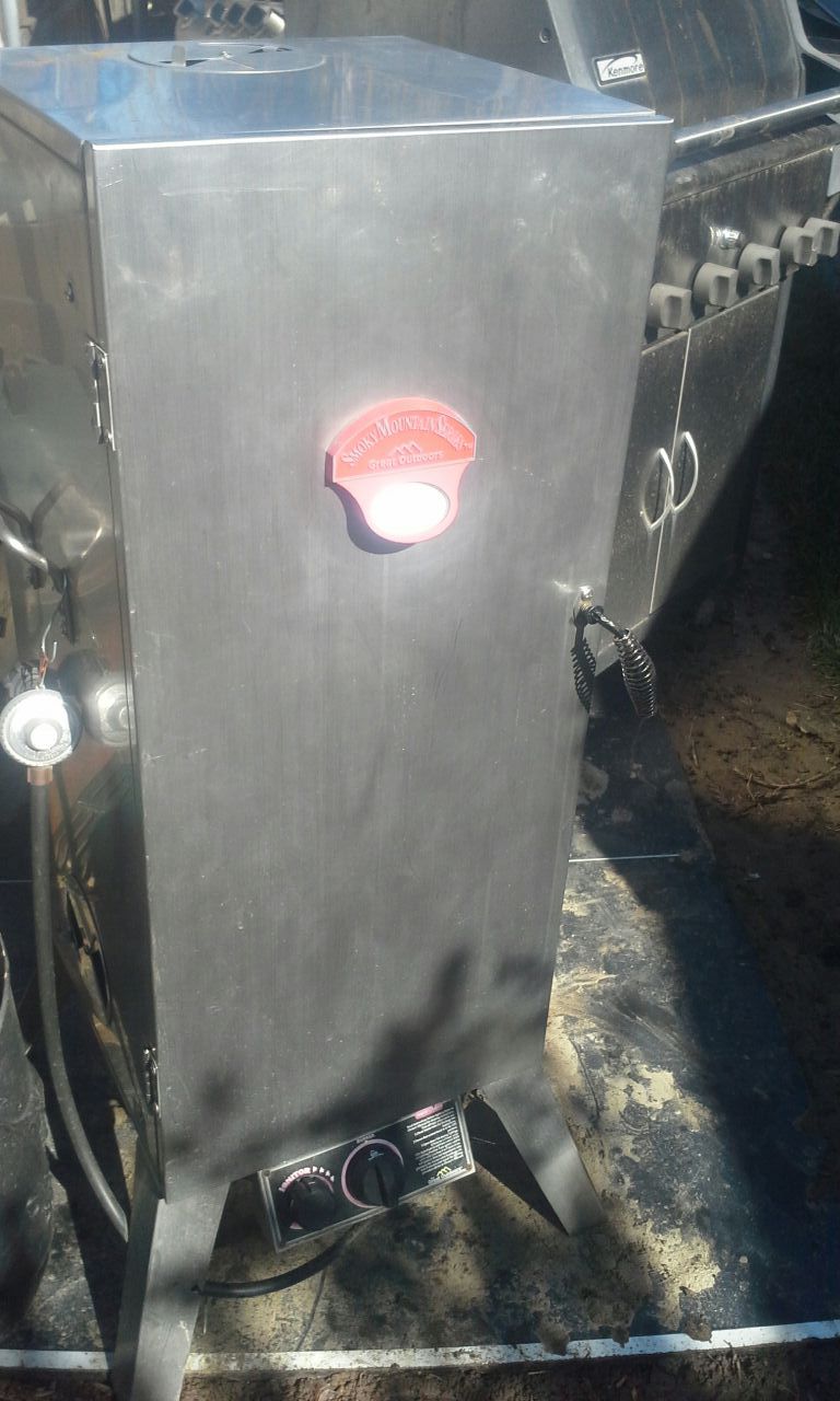 Great Outdoors Smoky Mountain Series 36 inches tall stainless steel used twice beautiful smoker gas smoker